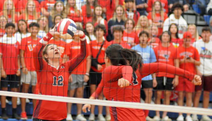 Lake Brantley setter Jordan Sigafoes puts up a set for Austin Knight during their match against Hagerty. Sigafoes led the Patriots with 18 assists.